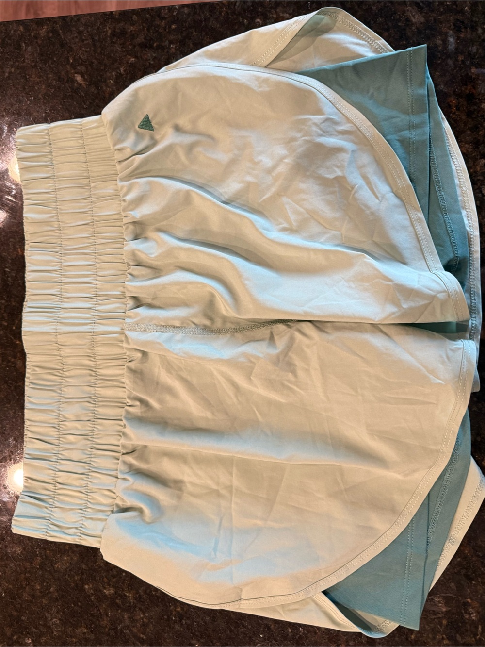 VITALITY GREEN RUNNING SHORTS